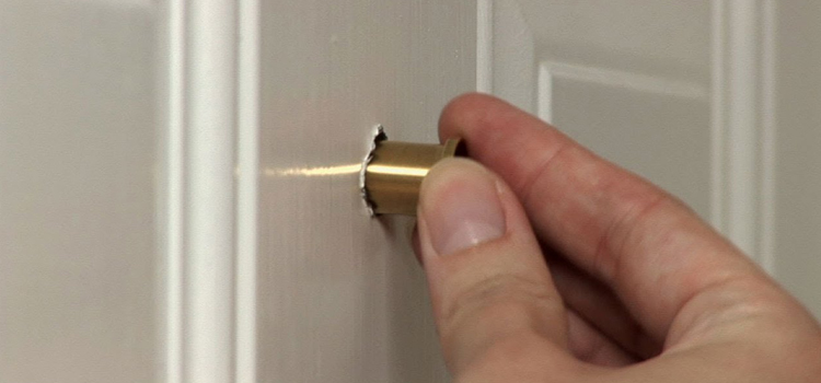 peephole door repair in Eola