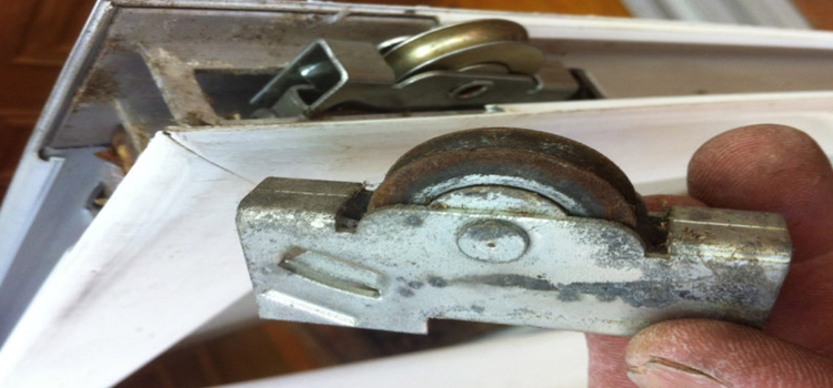 screen door roller repair in Eola